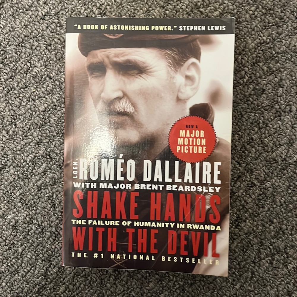 Shake Hands with the Devil softcover book